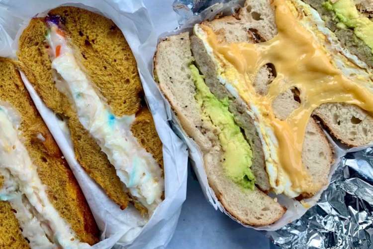 two bagel sandwiches cut open, one sweet, one savory