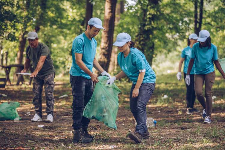 Volunteering is an excellent team building activity in Toronto.