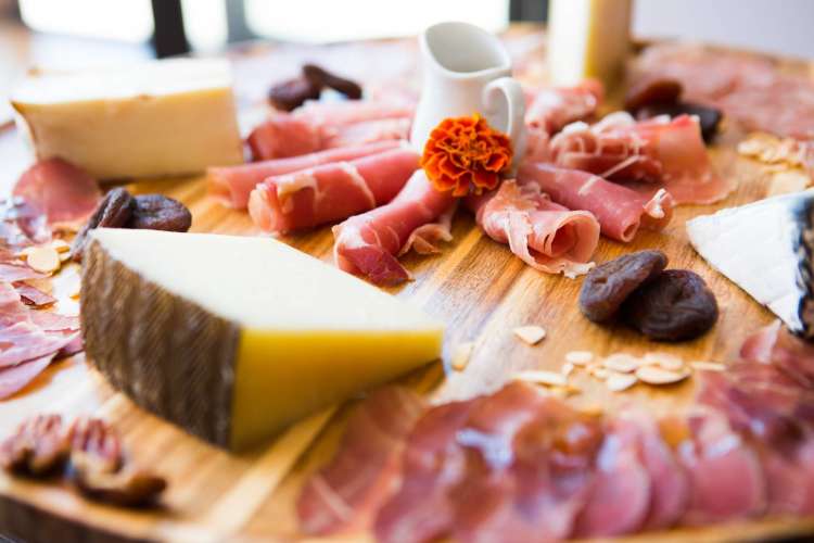 charcuterie board with meat and cheese