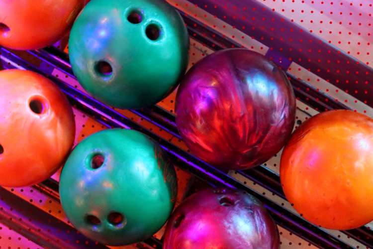 a group of colorful bowling balls