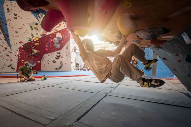 Rock wall climbing is an exhilarating team building activity in Charlotte.