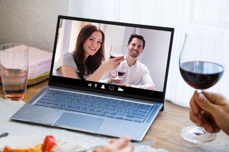 young couple enjoy a virtual wine tasting