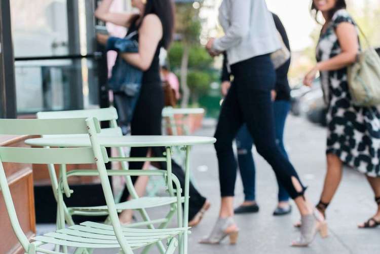 bachelorette party group exploring the city on a walking food tour