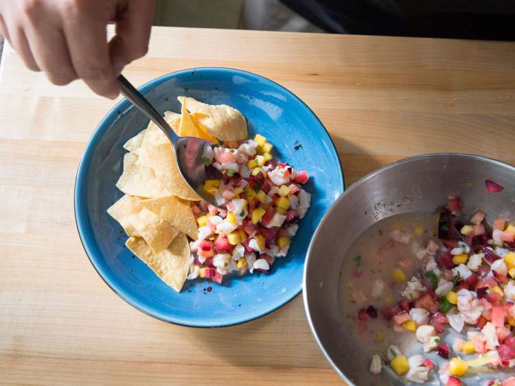 making homemade salsa in a cooking class