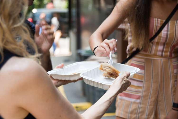 people enjoying a walking food tour