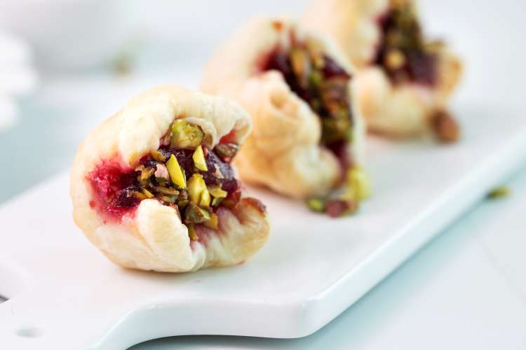 cranberry brie bites are an impressive yet easy super bowl appetizer