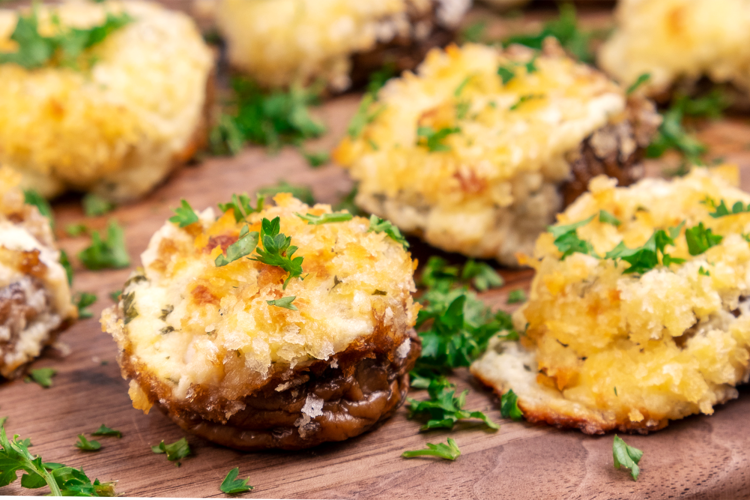 cream cheese stuffed mushrooms are a deliciously cheesy easy super bowl appetizer