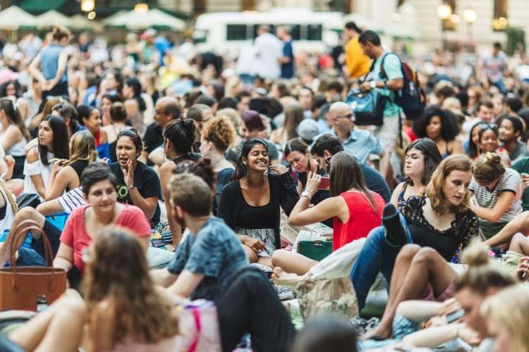 gathering for a movie night in bryant park is a fun thing to do during summer in nyc