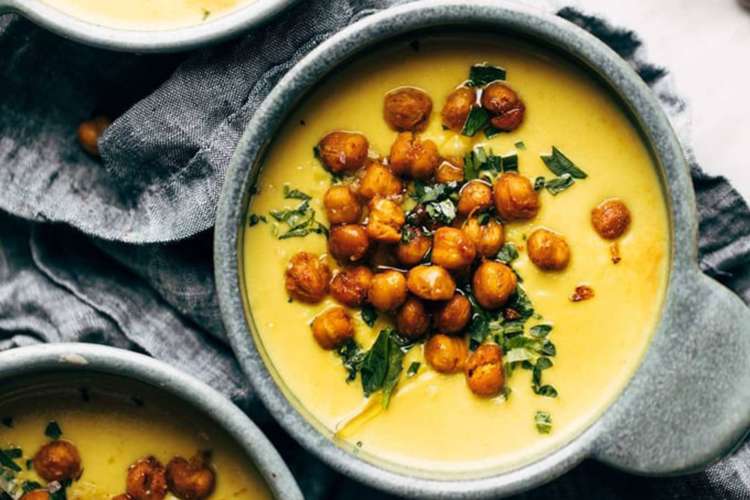 golden soup is filled with healthy ingredients