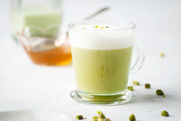 pistachio latte is a smooth and nutty vegan latte