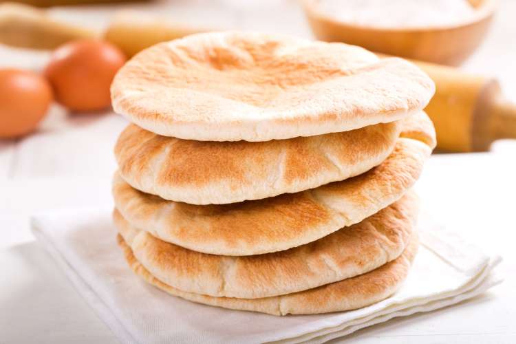 Pita bread is a foundational Greek food.