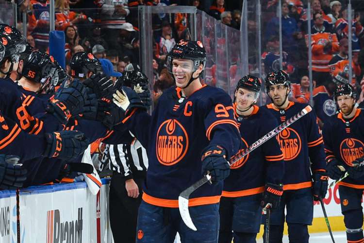 An Oilers game is a great team building activity in Edmonton.