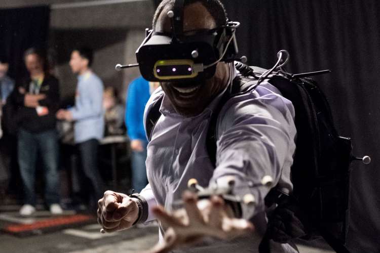 a man playing a virtual reality game