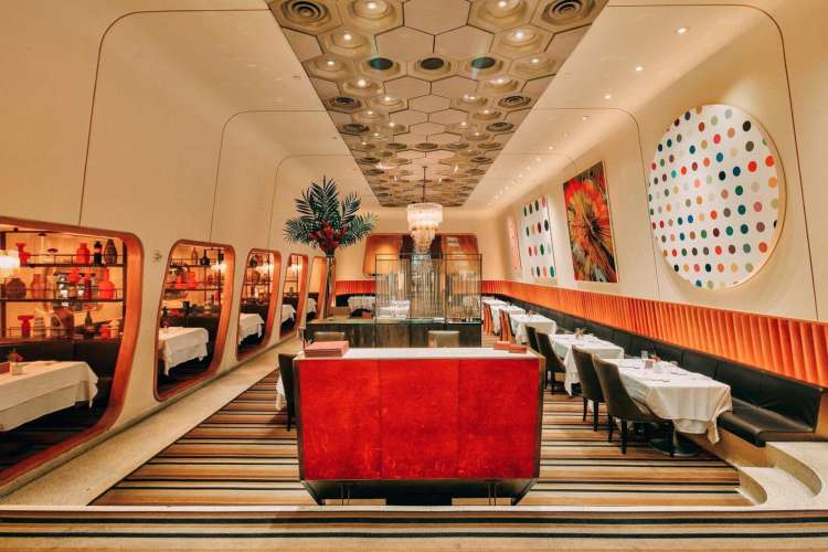 the colorful, modern interior of an NYC restaurant