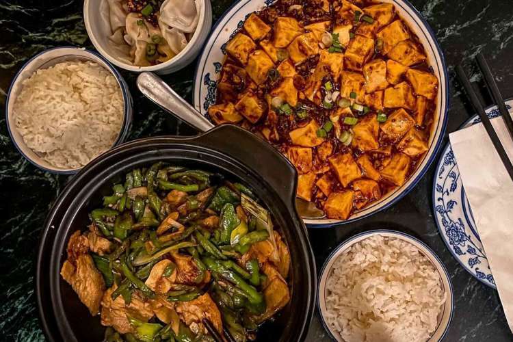 an array of Chines dishes including ma po tofu.