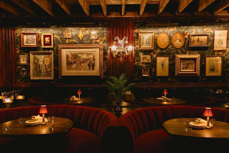 the dim, cozy interior of an Italian restaurant in Chicago