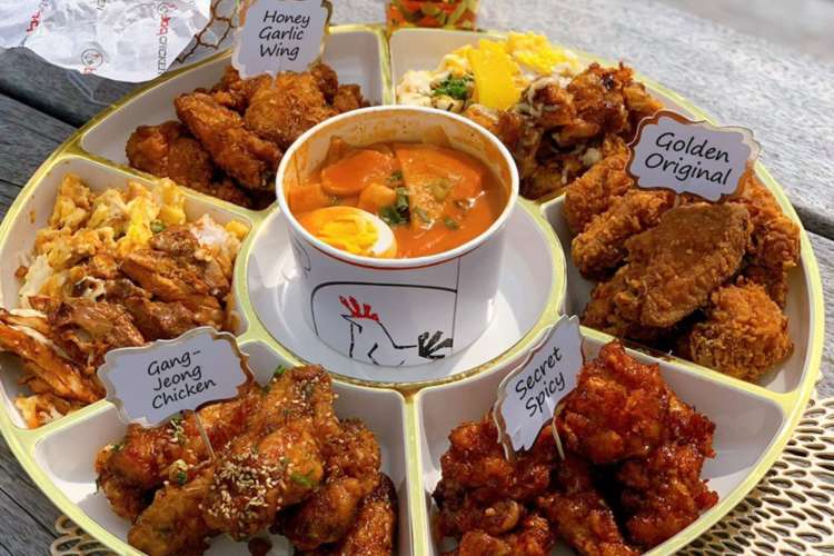 a variety display of Korean fried chicken flavors