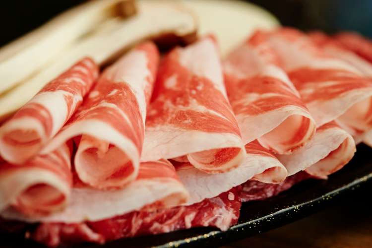 raw meat ready to be cooked at a Korean BBQ