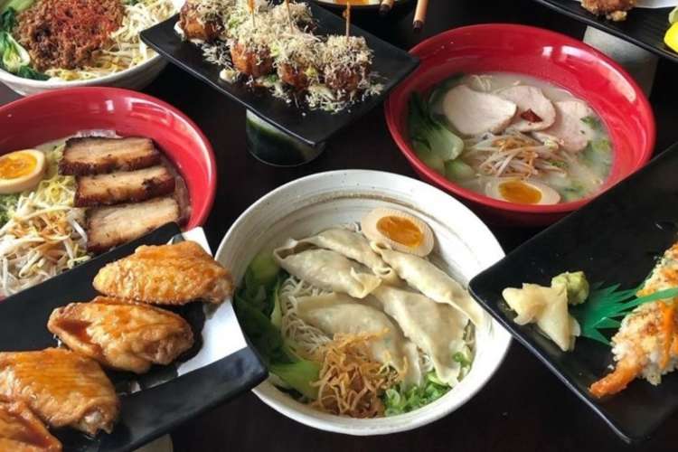 an array of ramen and sushi dishes