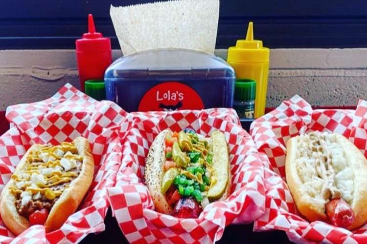 three Chicago hot dogs