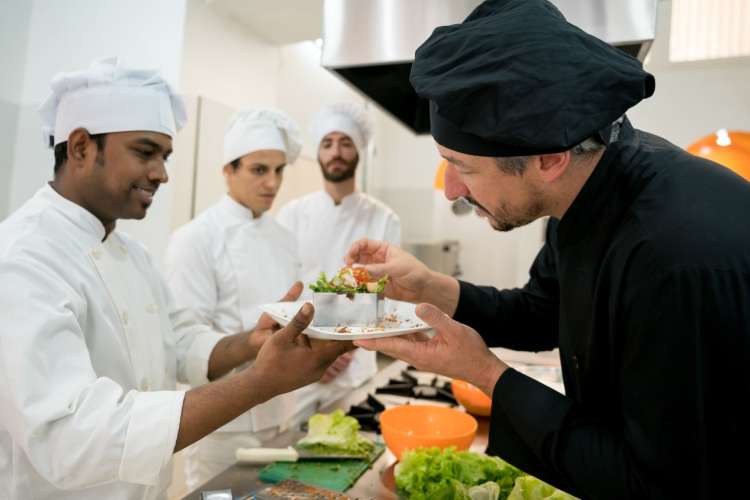 Overseeing the whole kitchen staff is one thing an executive chef does.