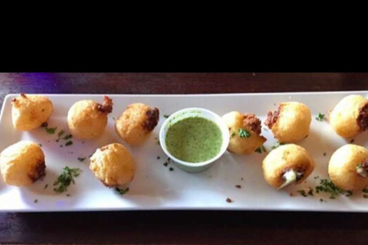 a platter of yuca cheese bites from a Cuban restaurant