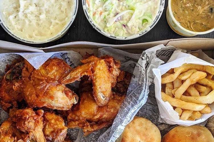 fried chicken and side dishes in containers