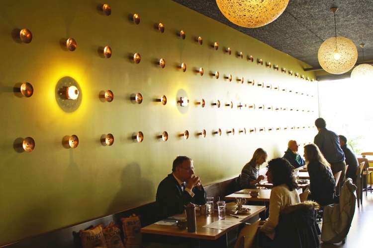 the dim, elegant interior of an Indian restaurant