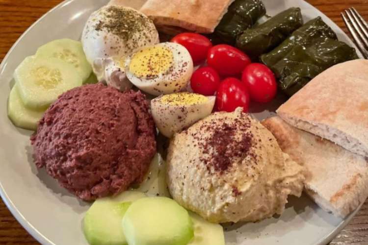 a plate of Mediterranean brunch food