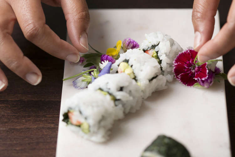 chef plating sushi rolls