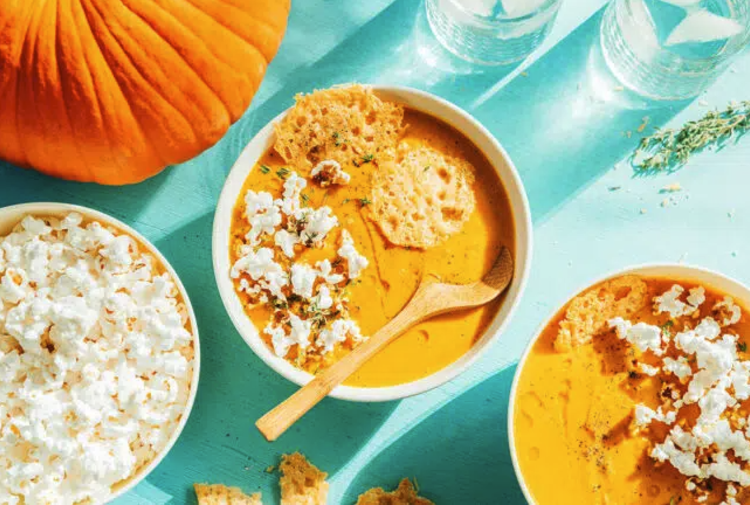 pumpkin soup with parmesan popcorn crunch is an elevated pumpkin vegetable soup recipe