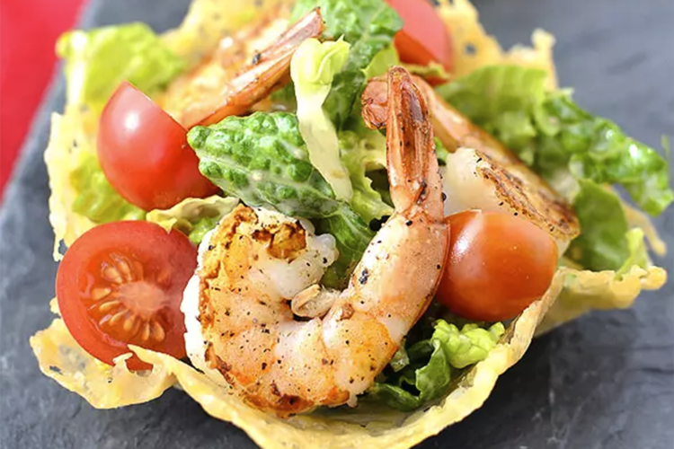 shrimp caesar salad in crispy parmesan cups are an easy and elegant healthy christmas appetizer