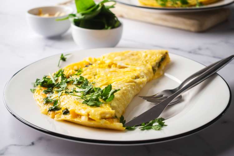 fresh spinach and creamy cheese shine in this spinach omelette recipe