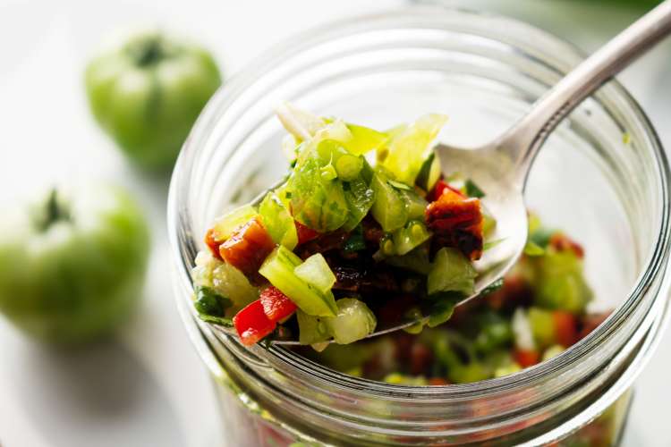 tomatillo red chili salsa brings a refreshing burst of flavor to any potluck