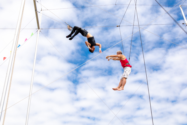 trapeze classes are unique team building activities