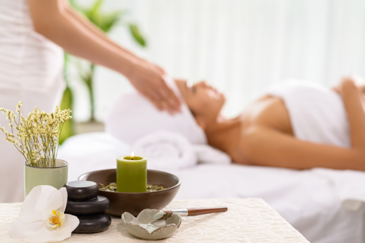 woman relaxing during a massage at a spa