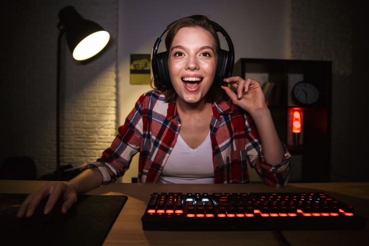 young woman playing a video game tournament