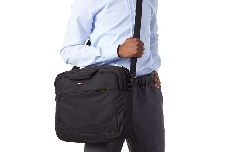 man carrying a black laptop bag