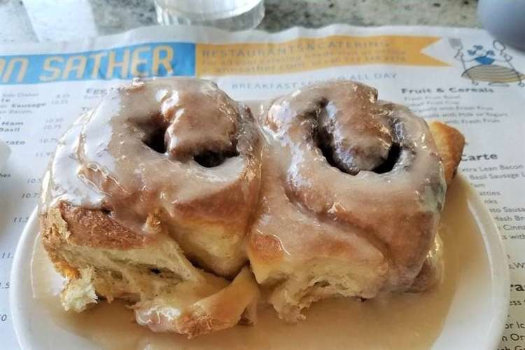 Two Ann Sather cinnamon rolls, a delectable Chicago food
