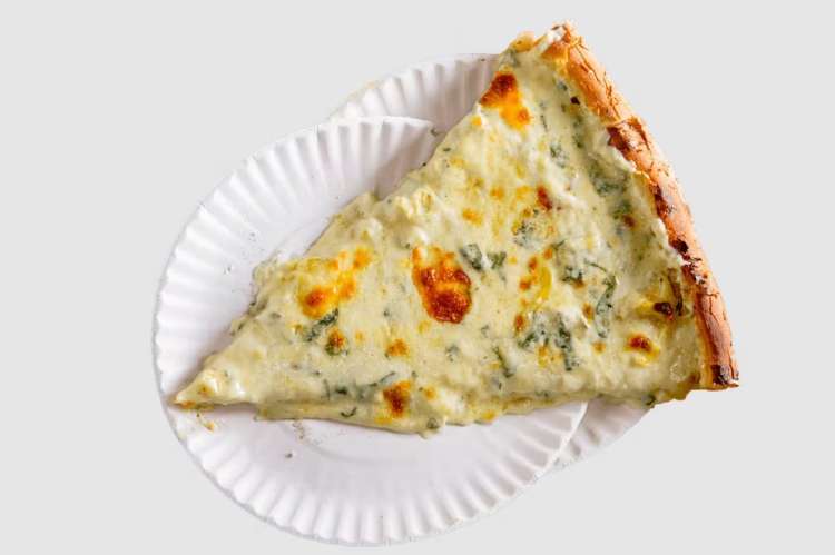 slice of artichoke pizza from artichoke basille's pizza in nyc