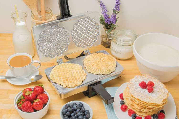 pizzelle iron with homemade pizzelle