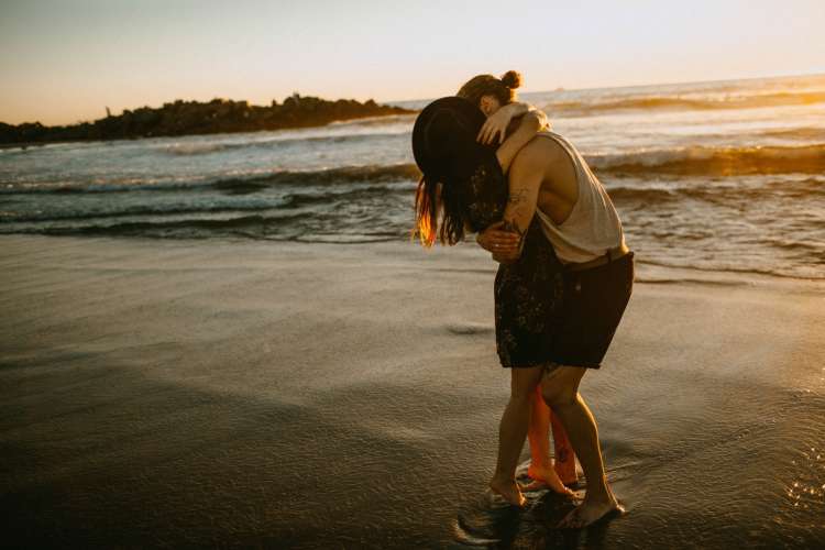 going to the beach is a fun thing for couples to do