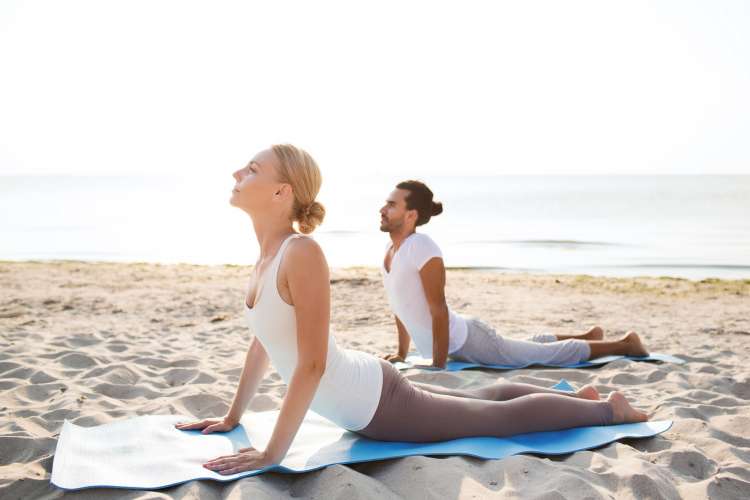 beach yoga is a relaxing date idea in miami