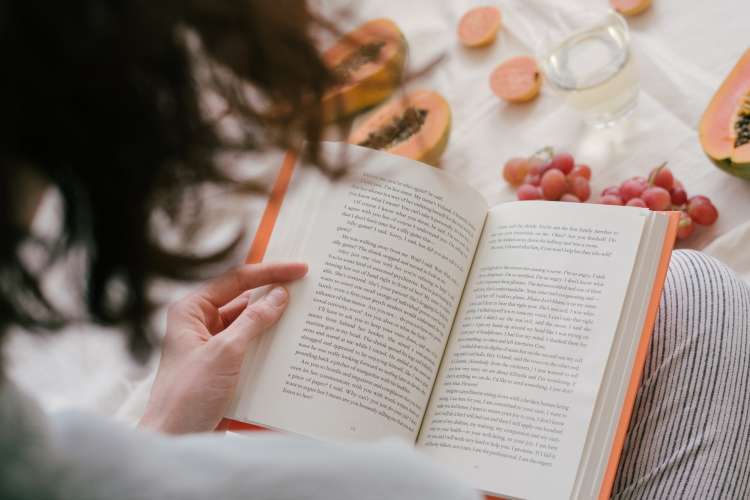 woman reading book