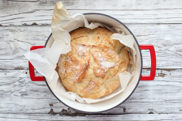 bread baking in a dutch oven