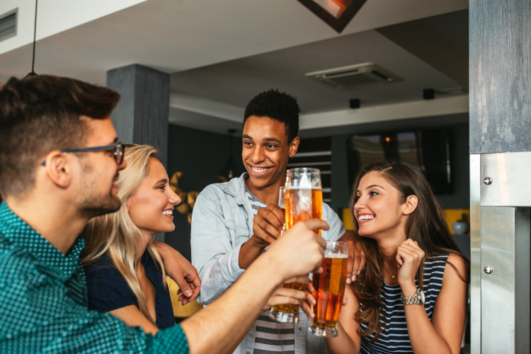 friends enjoying a double date at a brewery