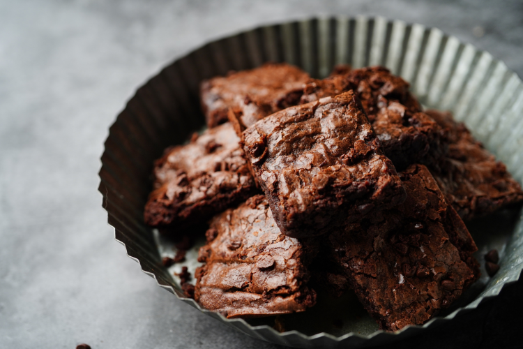 Chocolate brownies in a bowl, a popular dessert