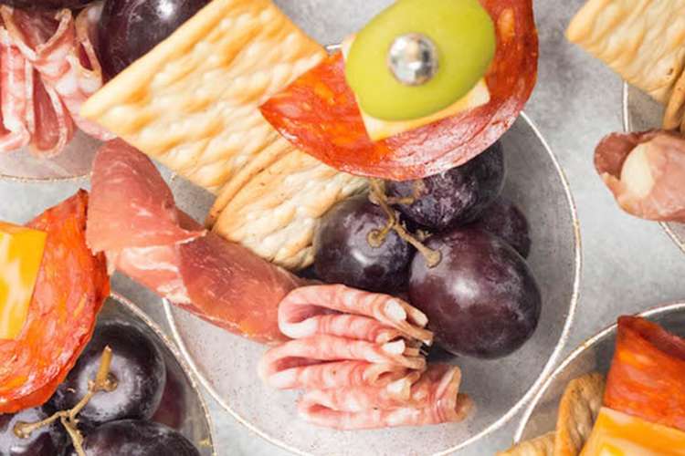 charcuterie cups are an easy way to serve cold super bowl appetizers