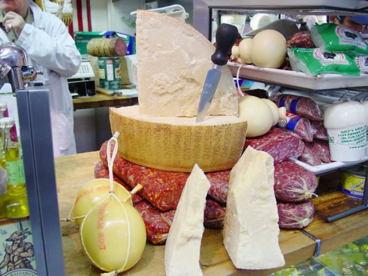 parmesan cheese wheel at mike's deli on arthur avenue