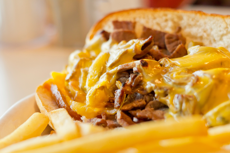 close-up of a philly cheesesteak with wiz